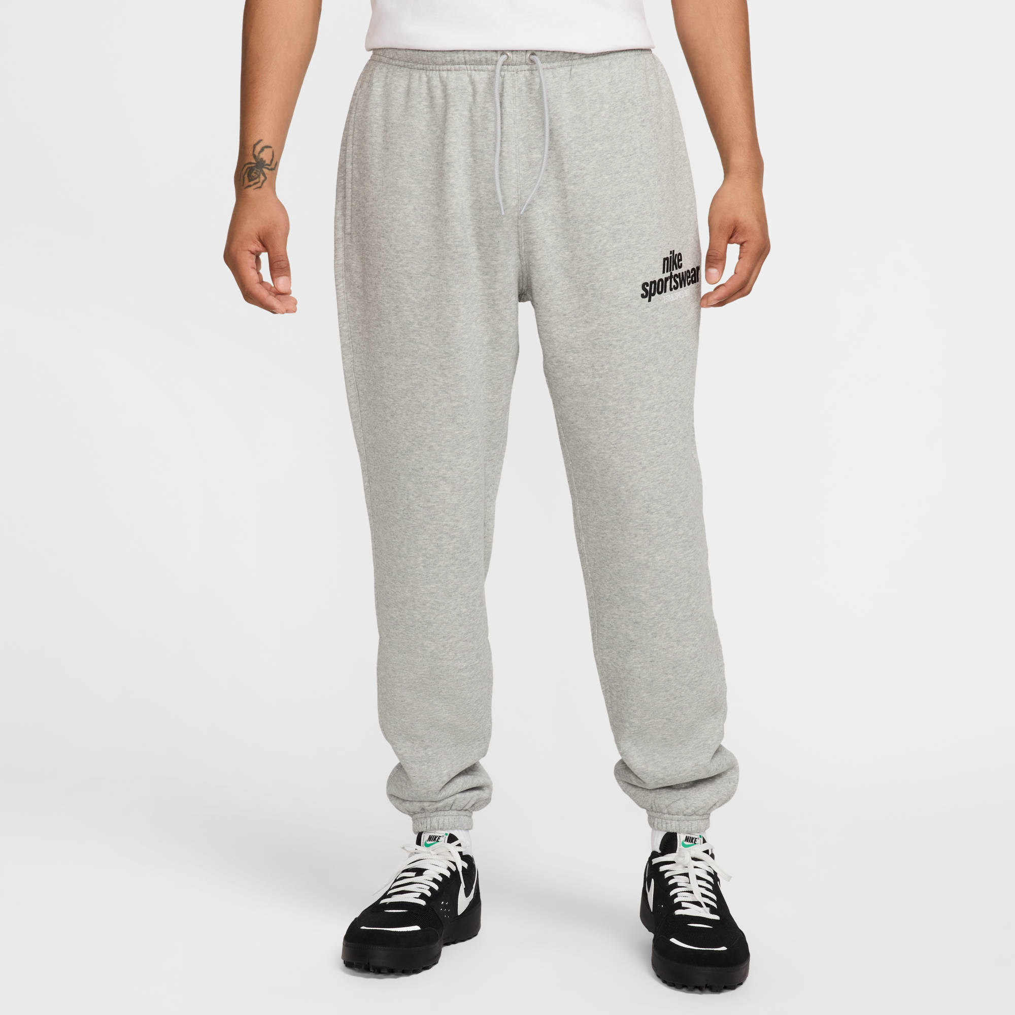 NIKE M NK CLUB BB CF PANT NSW GFX DK GREY HEATHER/LT SMOKE GREY/