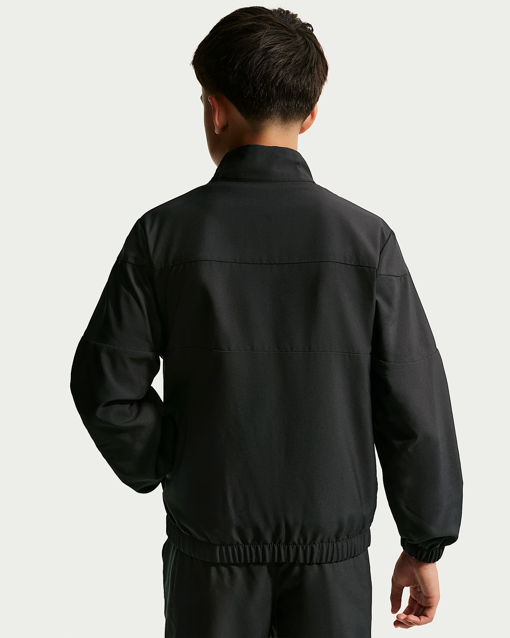 NIKE KM K TRACKSUIT WVN FZ BLACK/METALLIC GOLD – Bild 3